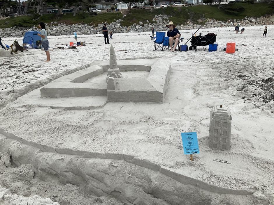 Sand sculpture of the Carmel Mission, rocket ship, and a tardis
