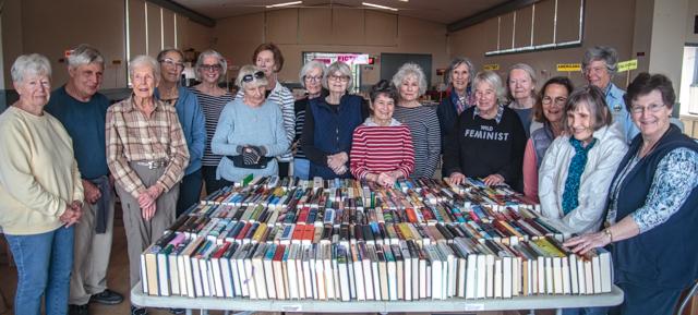Group of Friends of the Library selling books